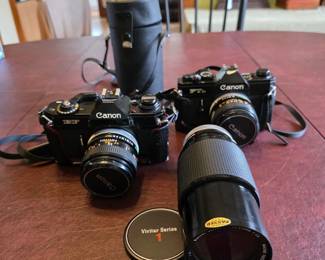1970' Canon 35 mm cameras with cases; Viviar Series 1 lens.