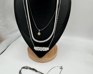 Costume Jewelry Featuring Heart Bracelet And WSU Necklace