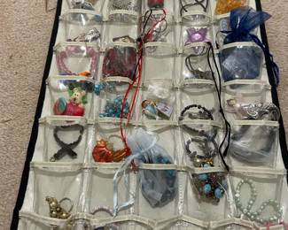 Mystery Lot Of Costume Jewelry With A Hanging Pouch Organizer