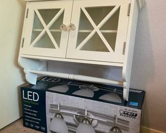 New In Box Vanity Light With Hanging CabinetTowel Rack