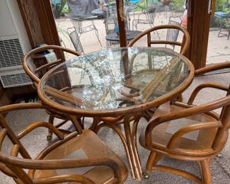 Mid Century Rattan Glass Round Table, with 4 Rattan Swivel Chairs on Casters