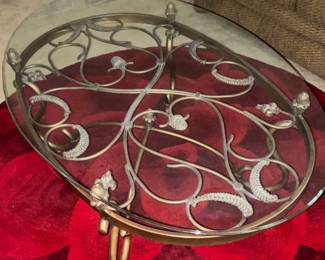 Oval glass top base with decorative base