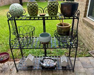 Metal three shelf plant stand - assorted pots and hanging baskets
