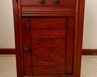 Vintage smoker’s cabinet / tobacco smoking stand with upper drawer and lower enclosed storage. Rich wood grain and traditional styling. Researched prior to sale.