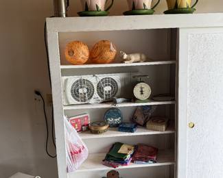 Garage: scale, planters, tins, flags