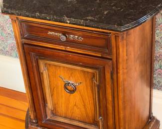 Cabinet with a Dark Marble top