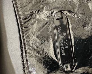 vintage pieces from Michael Kors (specifically from their late 2000s / early 2010s Michael Michael Kors contemporary collections).