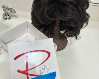 short, layered synthetic wig from the premium Raquel Welch Wig Collection.