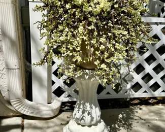 Elephant Bush succulent cascading from a planter resting on a traditional Cast Stone Baluster Garden Pedestal.