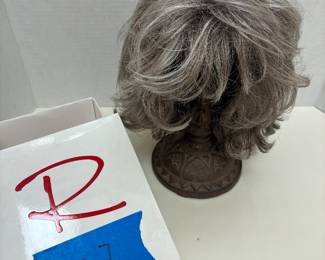 short, layered synthetic wig from the premium Raquel Welch Wig Collection.