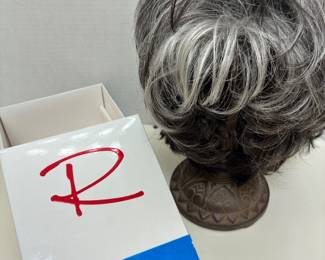short, layered synthetic wig from the premium Raquel Welch Wig Collection.