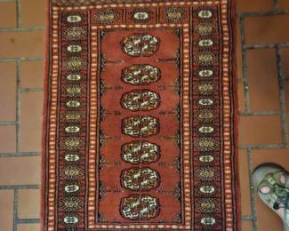 many hand woven oriental rugs - real - not mass produced reproductions