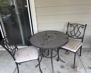 Outdoor Metal Patio Table and Chair Set with Decorative Cushions