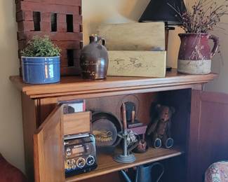 Cabinet with primitive and rustic decor
