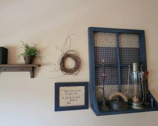 Shelves. Lanterns. Oil lamps. Lots of nice decor