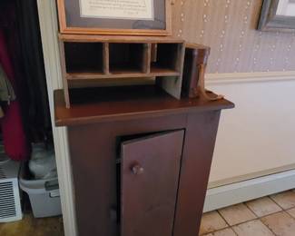 Cabinet, cubbies and "family" decor