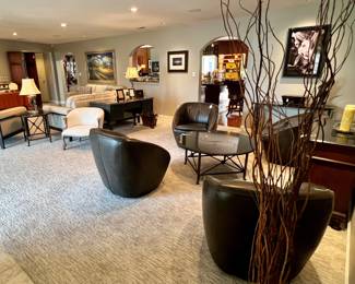 Separate seating groupings in this large room