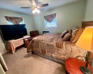 Another bedroom set with a queen bed