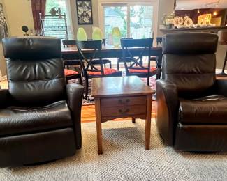 Pair of leather swivel rocker recliners...they are so comfortable!