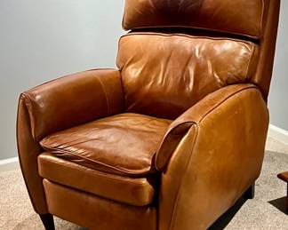 Extremely comfortable leather recliner with a stain... you you can figure out what to do with it. We put a throw over it. Takes the chill off.