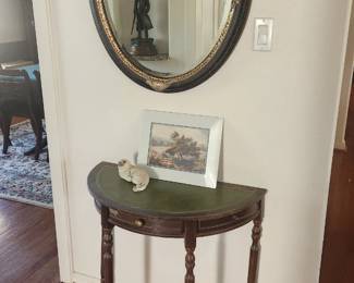 Beveled mirror with half moon table