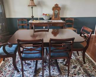 Duncan Phyfe table and chairs, library table, clocks