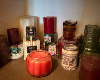 Assorted Collection of Decorative Scented Candles including NEST, Bath & Body Works, and Glade
