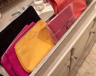 Collection of 5 LancĂ´me Cosmetic Bags