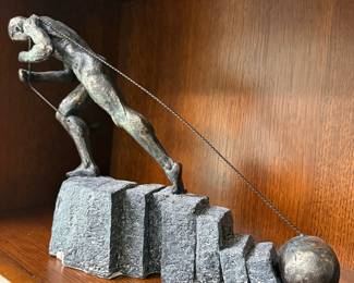 Sisyphus Pushing Boulder Sculpture