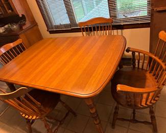 Table and 6 chairs with 3 leaves