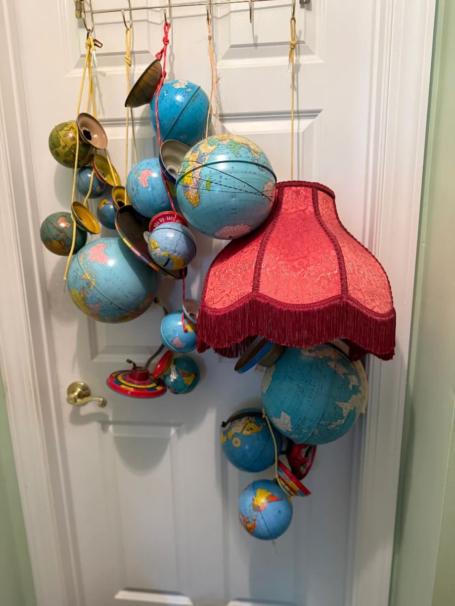 Tin globe mobiles