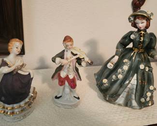 Mid-century porcelain colonial/Victorian figurines.