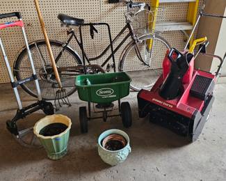 1970's Schwinn Bicycle, variety of flower pots, vintage gardening tool, snow blower, seed spreader, and other vintage items available in garage.