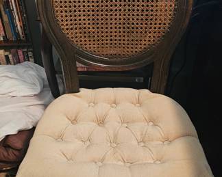 Assorted antique chairs in home.