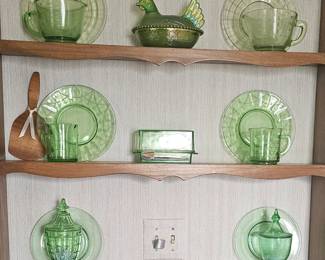 Tons of assorted green depression glass at this sale....plates, bowls, spice jars, cups, refrigerator containers, and more..