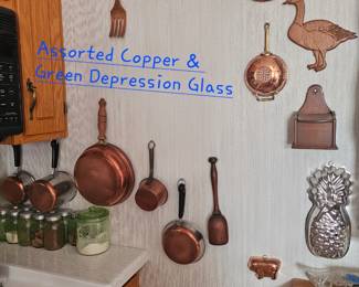 Assorted copper pieces and more green depression glass.