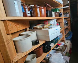 Numerous crocks, and canning jars.