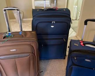 Two Samsonite And One Dockers Suitcase