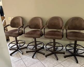Four Swivel Chairs
