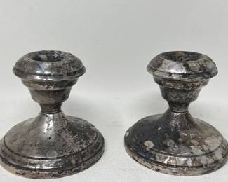 250 Lot 159u Pair of sterling silver weighted candleholders