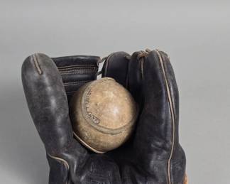 510 Lot 229 Vintage Nokona leather baseball glove with ball