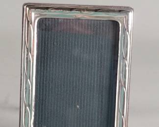 145 Lot 530 Sterling silver glass and wood picture frame