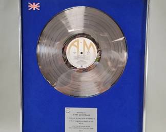 055 Lot 83 Vintage 1977 Jerry Weintraub sales award plaque