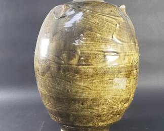 562 Lot 325 Antique olive green glazed stoneware storage jar