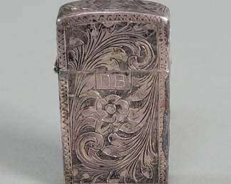 591 Lot 352 Silver lighter case with a Zippo lighter i