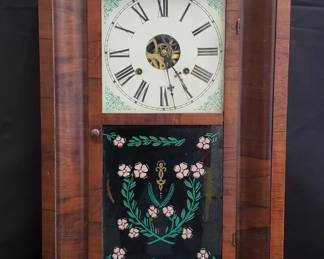 523 Lot 256 Waterbury Clock Co mahogany and reverse painted