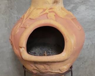 536 Lot 282 Vintage terracotta outdoor chiminea on metal stand