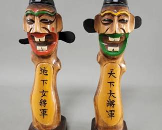 429 Lot 586 Pair of carved wood Jangseung figure