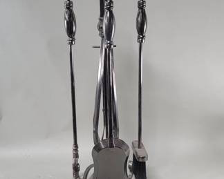 449 Lot 100 Contemporary iron fire tools set