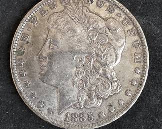 769 Lot 8 1885O Morgan silver dollar coin